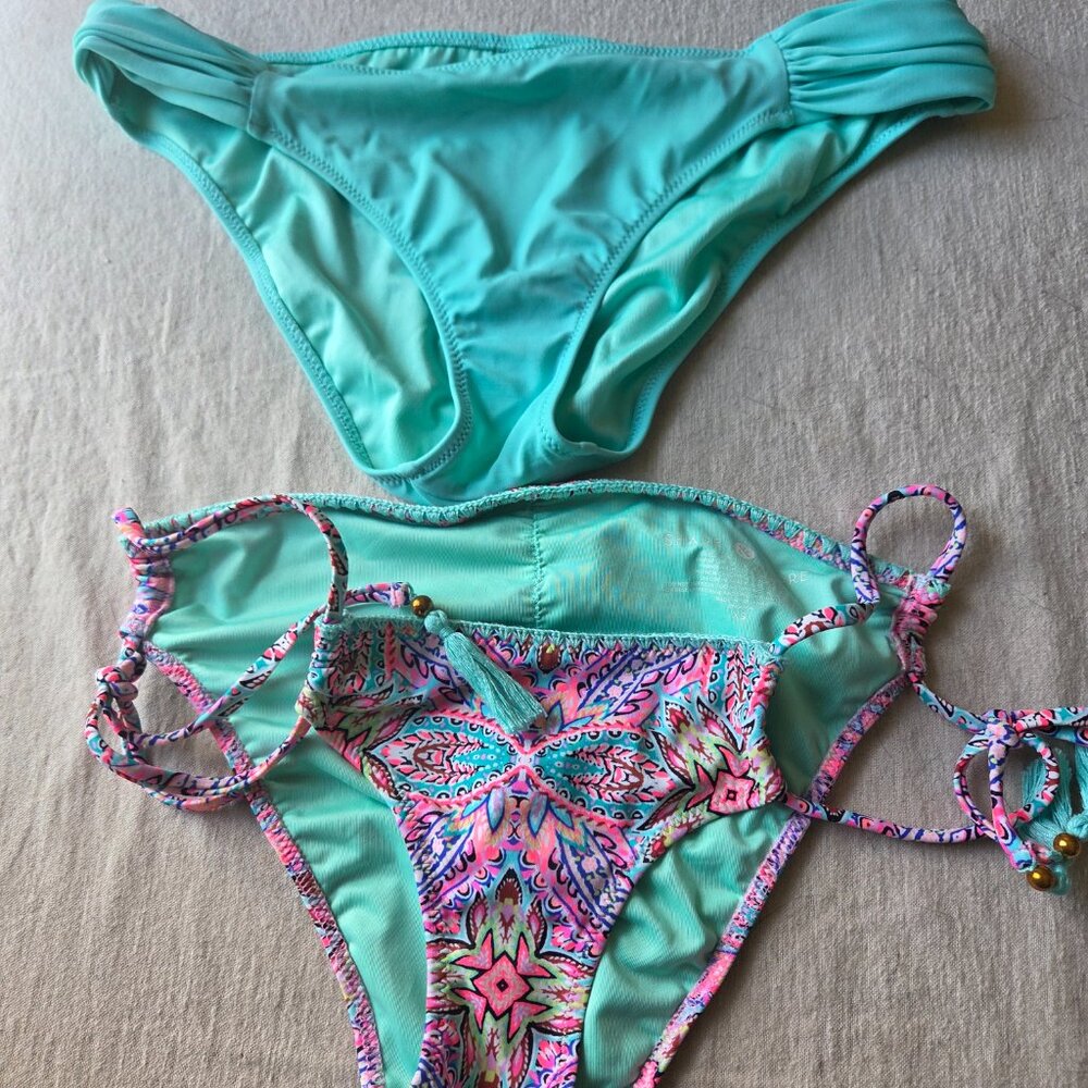 2 Pairs of bikini bottoms. XS